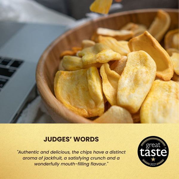 Close-up view of Hey! Chips jackfruit crisps in a wooden bowl, with the Great Taste 2021 badge and the text: Judges' Words – ‘Authentic and delicious, the chips have a distinct aroma of jackfruit, a satisfying crunch, and a wonderfully mouth-filling flavour.’