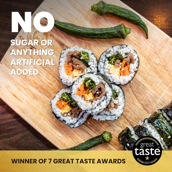 Sushi with Hey! Chips okra crisps, text stating 'No sugar or anything artificial added,' and Great Taste 2021 badge with text 'Winner of 7 Great Taste Awards.'