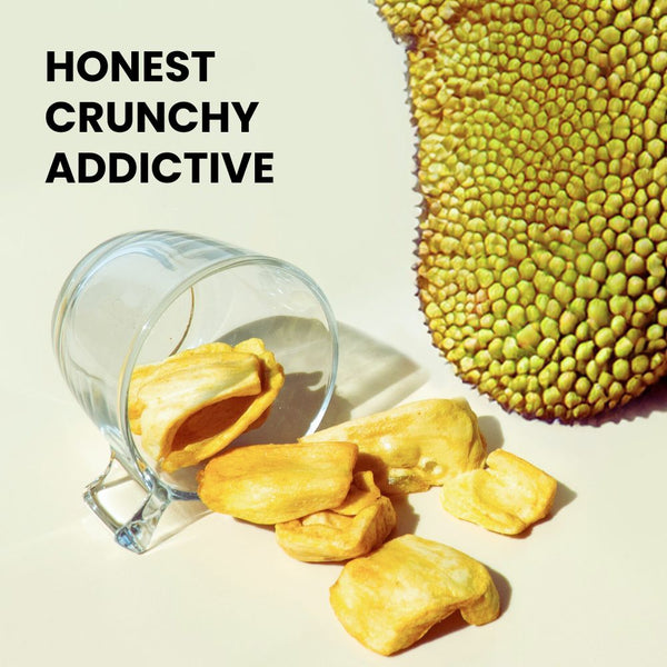 Hey! Chips jackfruit crisps scattered outside a glass mug with real jackfruit on the side with text Honest Crunchy Addictive.