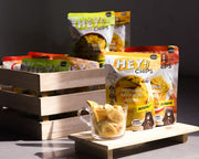 Hey! Chips packs in a wooden box with actual banana crisps in a glass mug.